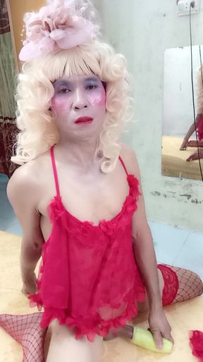 Oanh Le transgender wearing suggestive clothes to play with cans pretending to be too happy