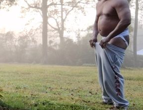 Taking a quick piss in the yard