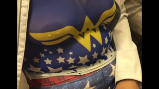Wife in See through wonder women shirt with pierced nipples in public