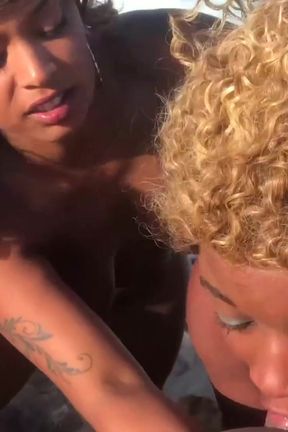 Hot ebony girls fucks on beach