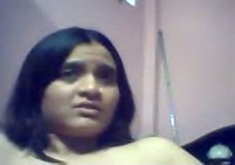 Slutty Indian teen flashes her natural tits in webcam solo