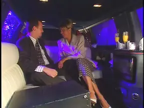 Busty MILF rides cock in limousine session