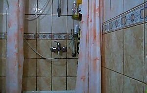 Amateur crossdresser in a shower