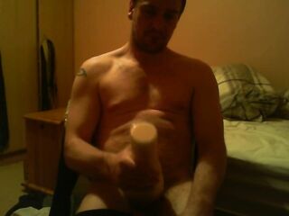 Sitting on chair watching porn screwing a felsh light untill I ejaculate