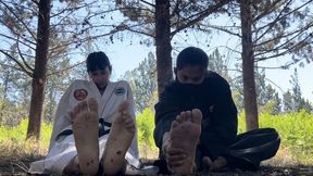 Outdoor kicking female black belt