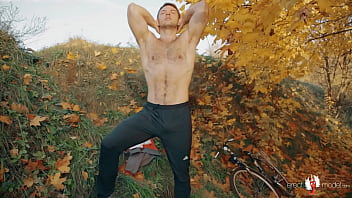 Nude gay bear cyclist and masterbating under the autumn tree