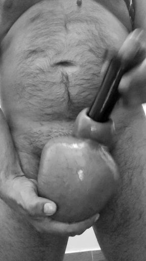 Playing with the dildo