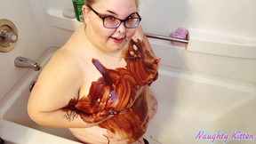 naughty kitten chocolate sauce sploshing