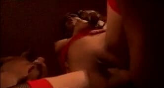 Big tit brunette gets fucked by two cocks