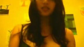My charming exotic GF fingers her shaved pussy in front of a webcam