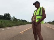Construction worker in middle of road naked and jacking off.  Eats own cum.