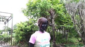 Black paint on her Asian skin