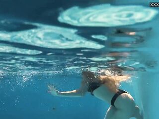 Consummate body golden-haired teen enjoys in nature's garb swimming