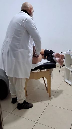 A MILF Gets Fingered by the Proctologist During an Anal Exam.