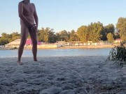 Dude pissing, jerking and cumming at nude beach