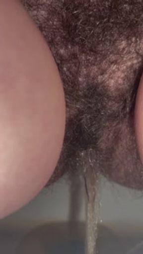 Hairy MILF pussy peeing after holding it all day! Want to lick it clean for me?