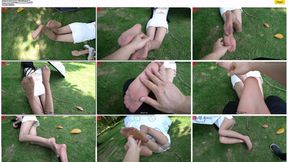 Miao Miao in a miniskirt and skin-colored pantyhose was lying on the grass in the park and letting me play with her sexy legs