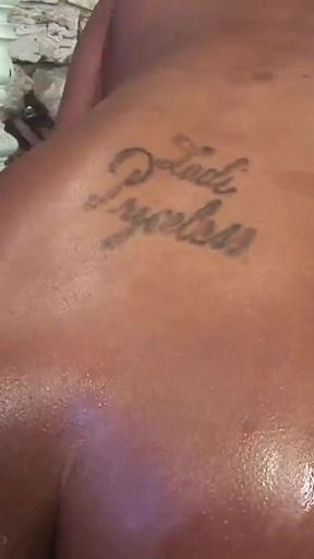 Megan Pryce an ebony slut with tattooed skin and brunette hair fucks with a bbc pounding her pussy