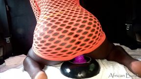 African Slut Riding Huge Dildo In The Car