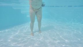 SFW - Beautiful teen swimming underwater