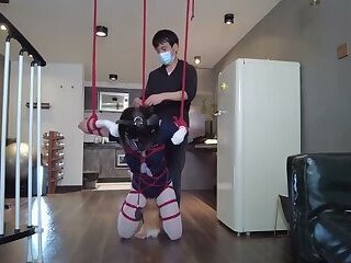 Mz31 - a Girl Tied and Suspended by a Red Rope Reaches Orgasm.