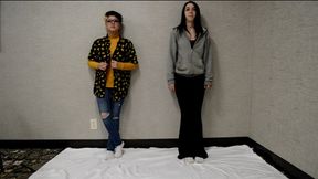 Alice and Dylan pose their feet together (1080p)