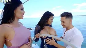 Huge titted Honey Demon and Kesha Ortega awesome three way in the boat