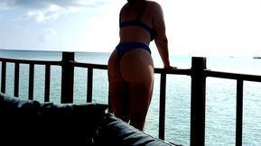 Hot Babe gives fast and sloppy Handjob on the Terrace over the Ocean
