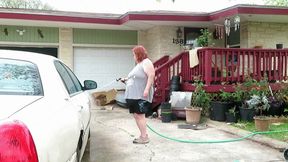 Sexy Mature bbw redhead Nurse Vicki washes her car first in tank top and shorts then strips to bikini! Wmv