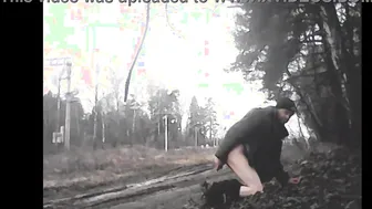 Outdoor anal masturbation in public forest setting