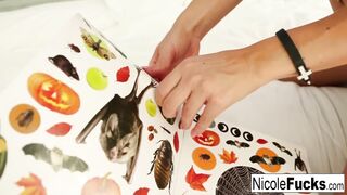 Nicole Aniston plays with Halloween stickers then her wet pussy