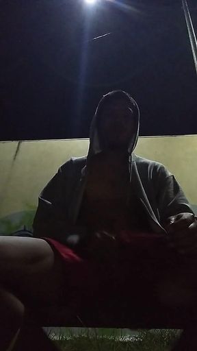 No Warm Shirt Man in Park with Only Sweater on Feeling Warm