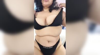 Black bra tease fuels fevered body movement