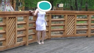 MILF in the park flashing her pussy on a bench