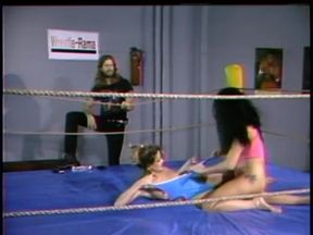Sexy sluts catfight wrestle in oil