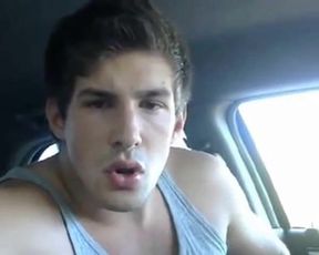 Big-cock jock strokes in his car