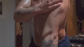 Oiled up nude natural pec flexing