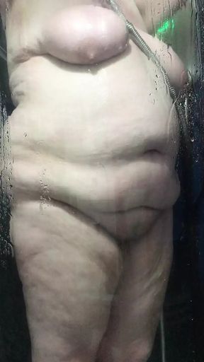 Mature big tits BBW Alex in shower. Who wants to help soap these big tits up?