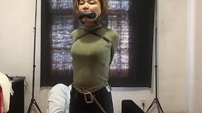 Chinese Girl In Straitjacket And Armbinder