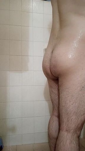 Muscular Jock Relaxes in the Shower