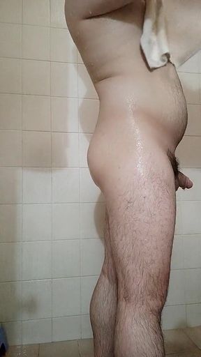 Muscular Jock Relaxes in the Shower