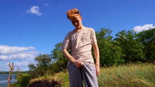 Summer fun of two young guys. Sucking by the sea