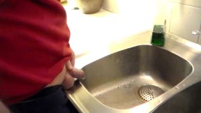 John Is Pissing in the Kitchen Sink