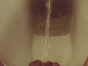 Close-up hairy pussy pissing  on public toilet after holding