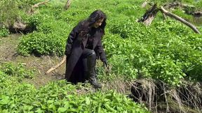 Girl got stuck in swamp, messy clothes, muddy boots, struggling, stuck in swamp fully clothes