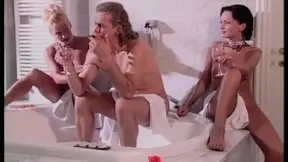 Hot MILF watches as stud fucks two women