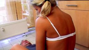 A stunning German babe jumping on a hard rod in the kitchen
