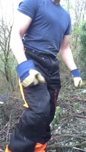 Muscular lumberjack cuts trees then strips to his jockstrap then gets naked and oils up his muscles!