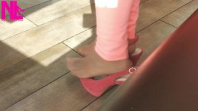 Shoeplay with High Heels in a Bar