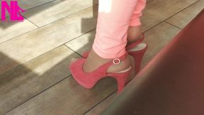 Shoeplay with High Heels in a Bar